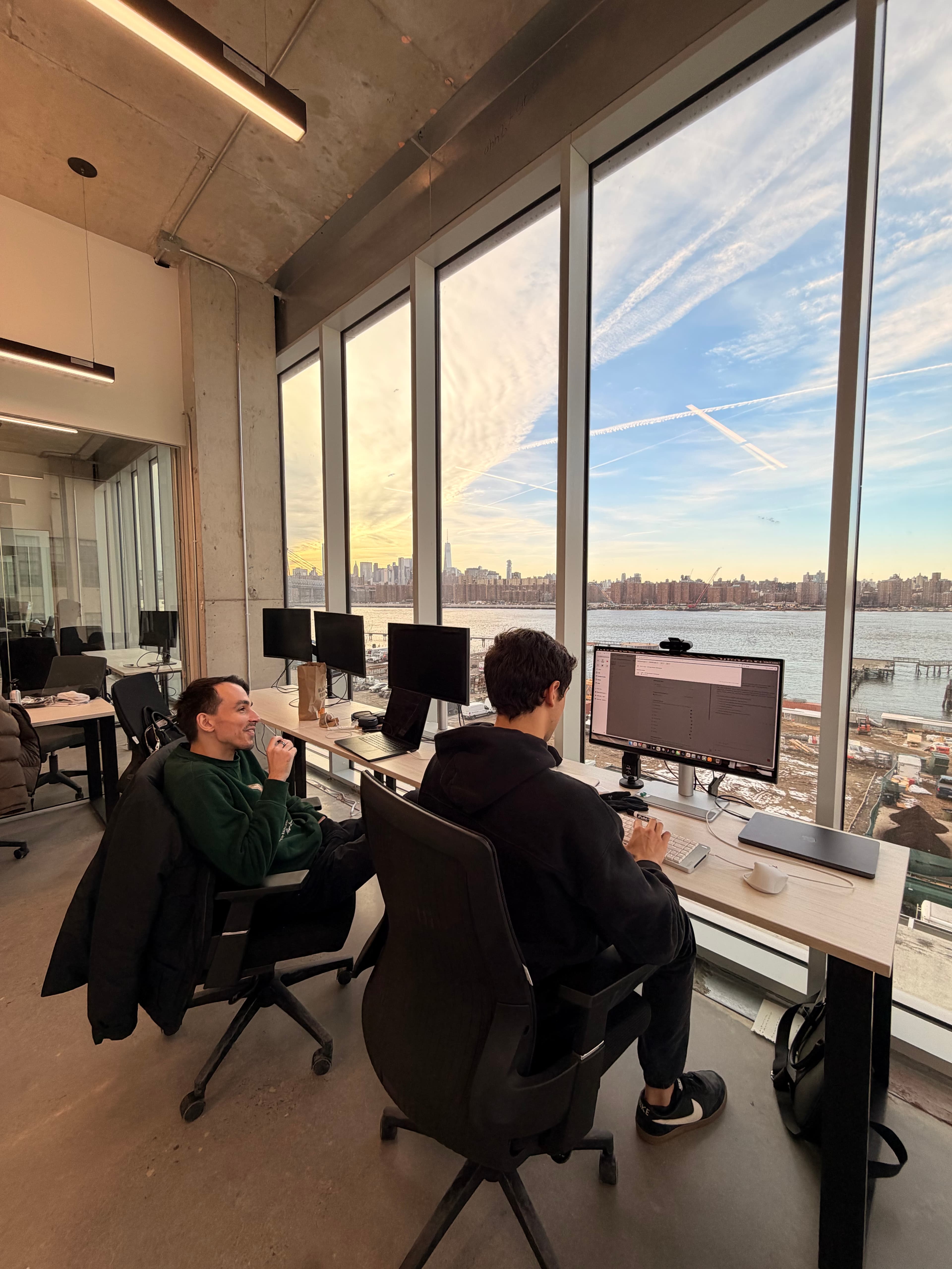 Kya team members in collaborative teamwork, building AI products together